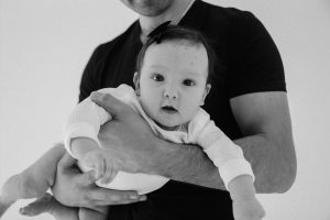 father holding his baby